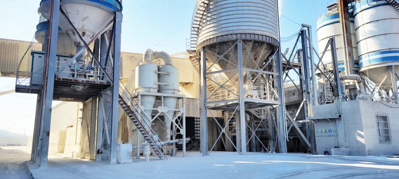 Internal grinding chamber of Raymond mill showing rollers and ring