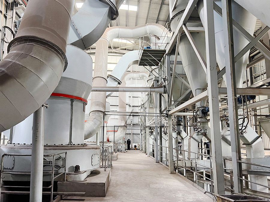 Raymond Mill grinding limestone powder in industrial production line